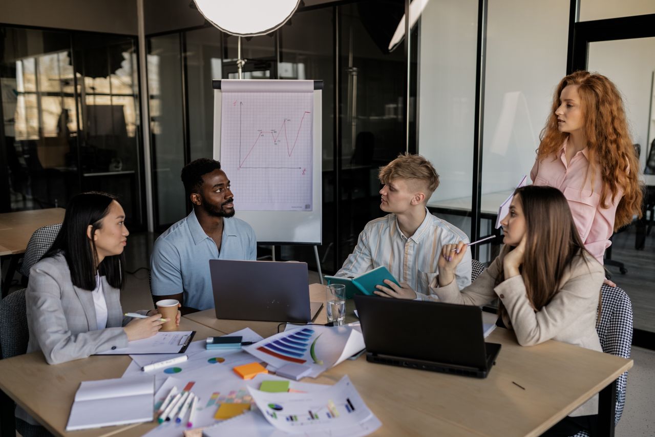 A diverse team discussing business strategy